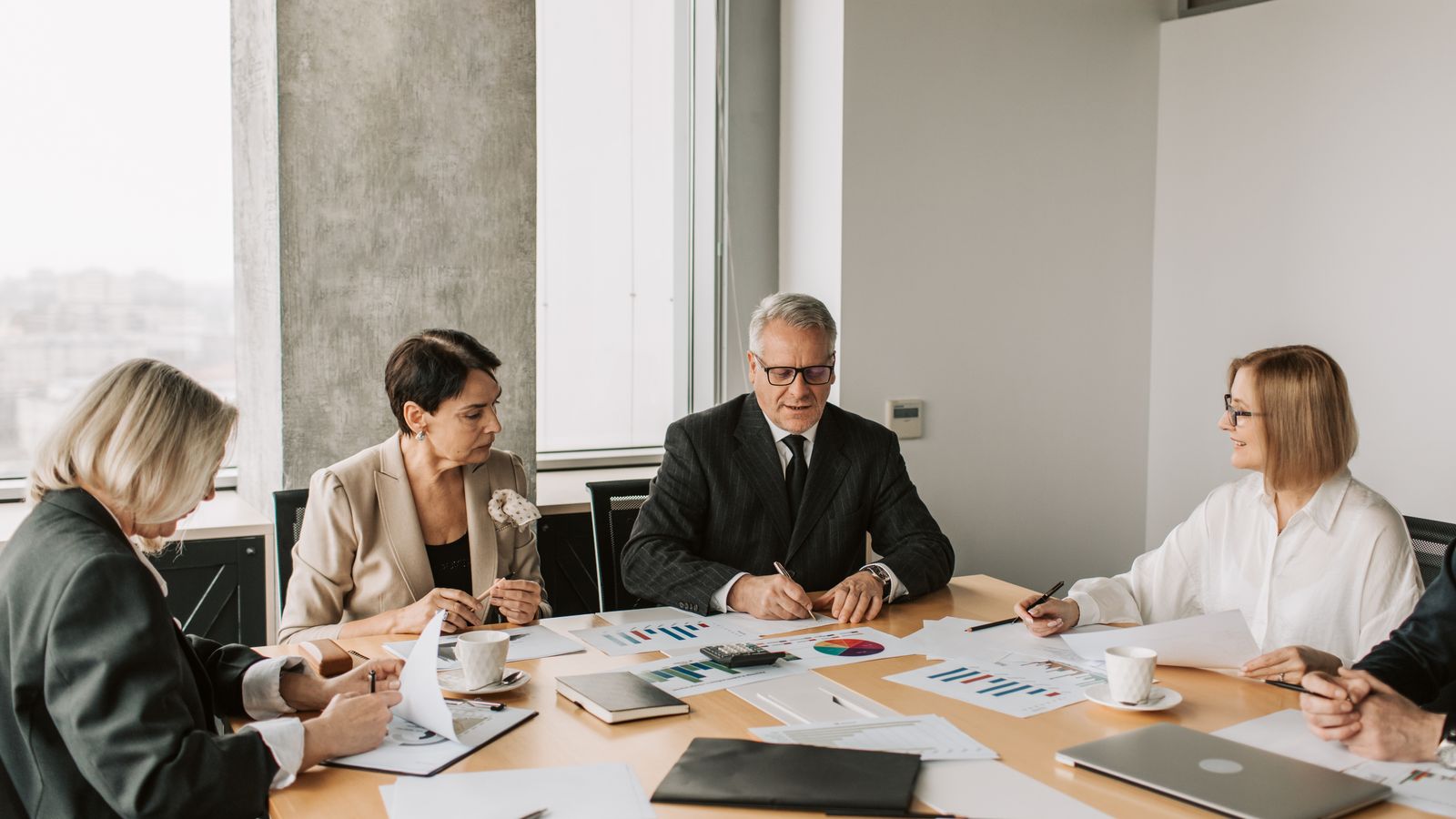 International business team evaluating Korean patent counsel